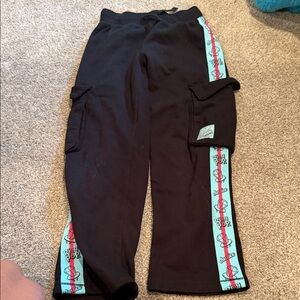 Justice Black Sweatpants with Aqua & Pink Side Stripe